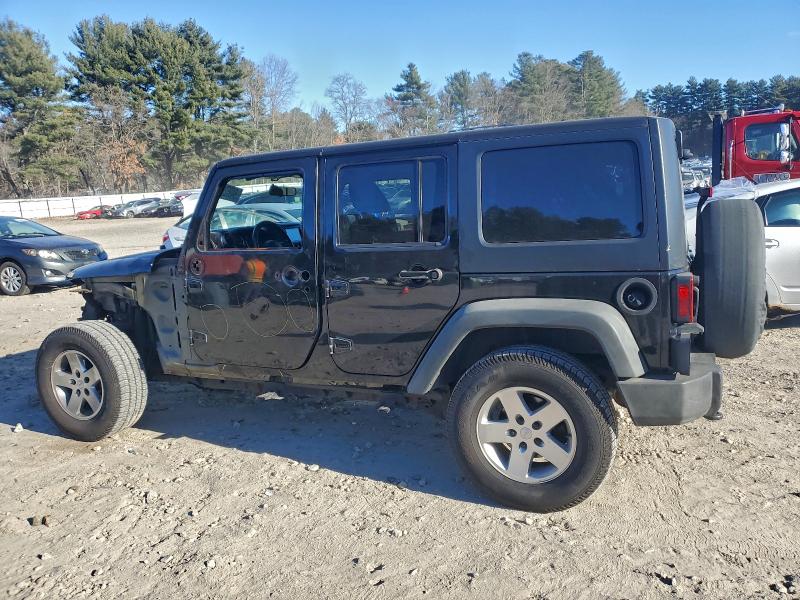 Photo 2 from auction – 2011 JEEP WRANGLER U with VIN 1J4BA3H11BL517856