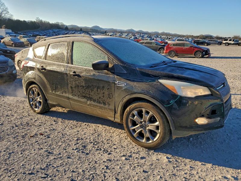 Photo 4 from auction – 2014 FORD ESCAPE SE with VIN 1FMCU9G97EUE32378