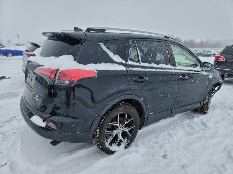 Photo 3 from auction – 2017 TOYOTA RAV4 HV SE with VIN JTMJJREV5HD110444