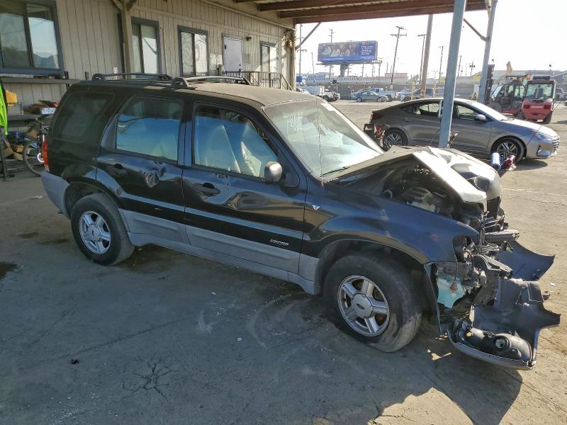 Photo 4 from auction – 2001 FORD ESCAPE XLS with VIN 1FMYU01101KA58495