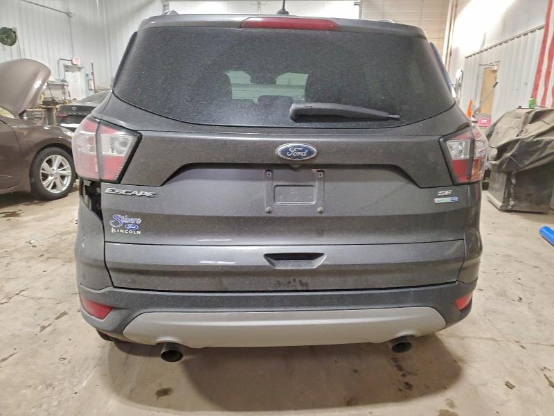 Photo 6 from auction – 2018 FORD ESCAPE SE with VIN 1FMCU9GD9JUC19995