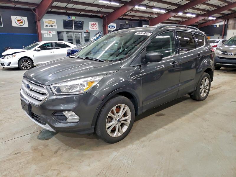 FORD ESCAPE SE 2018 with VIN 1FMCU9GD0JUD46036 - Photo from auction