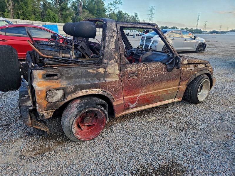 Photo 3 from auction – 1996 GEO TRACKER with VIN 2CNBJ1869T6947985