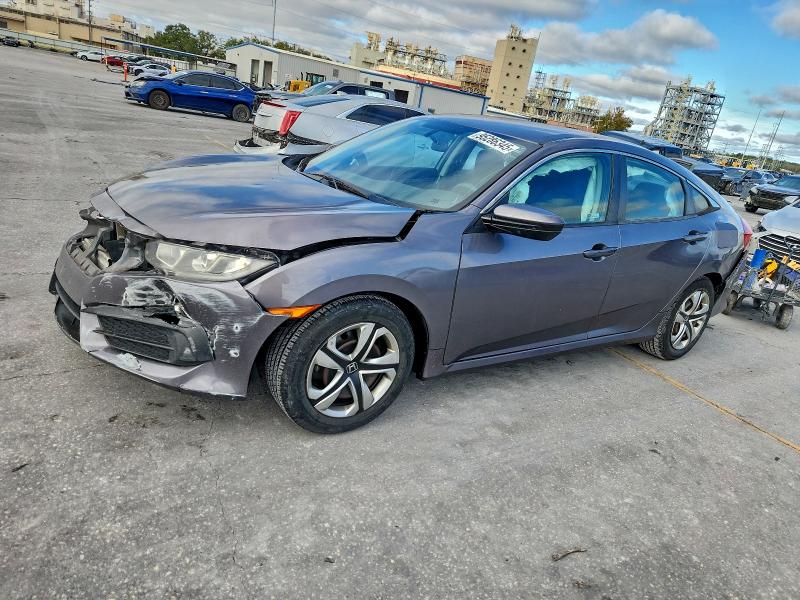 HONDA CIVIC LX 2018 with VIN 19XFC2F57JE014132 - Photo from auction