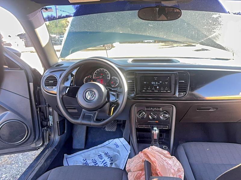 Photo 9 from auction – 2014 VOLKSWAGEN BEETLE with VIN 3VWFP7AT6EM624054