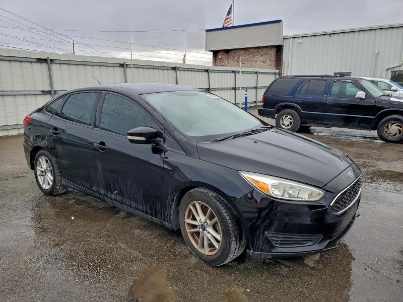 Photo 4 from auction – 2017 FORD FOCUS SE with VIN 1FADP3F28HL257379