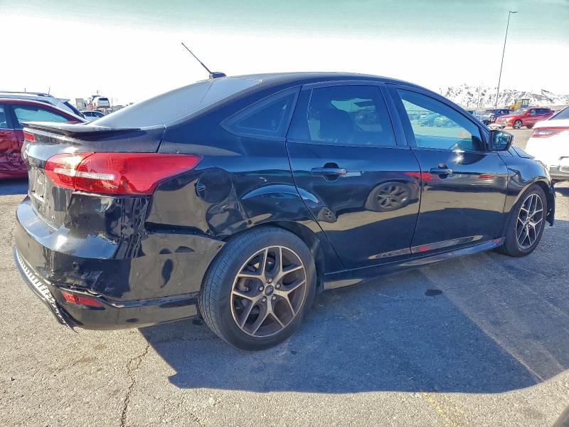 Photo 3 from auction – 2016 FORD FOCUS with VIN 1FADP3F25GL225598