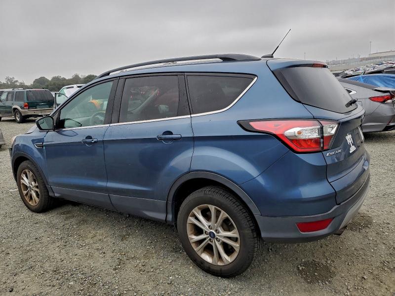 Photo 2 from auction – 2018 FORD ESCAPE SE with VIN 1FMCU9GD8JUC48940