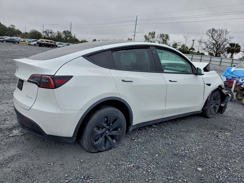 Photo 3 from auction – 2022 TESLA MODEL Y with VIN 7SAYGDEE7NF543674