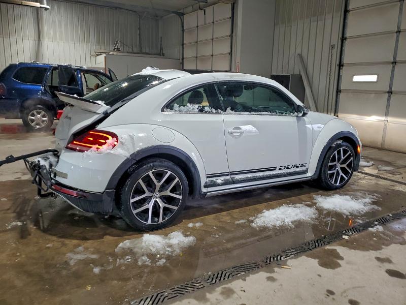 Photo 3 from auction – 2018 VOLKSWAGEN BEETLE DUN with VIN 3VWSD7AT0JM714804