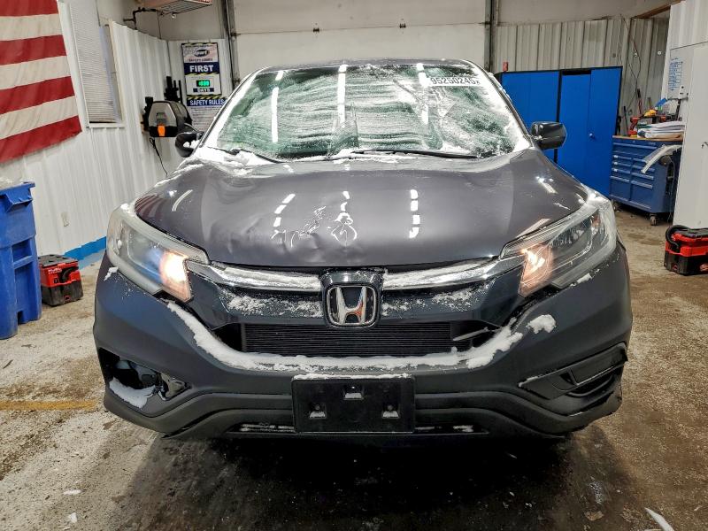 Photo 5 from auction – 2016 HONDA CR-V SE with VIN 5J6RM4H48GL028139