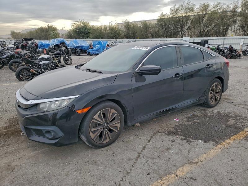 HONDA CIVIC EX 2017 with VIN 19XFC1F46HE025747 - Photo from auction