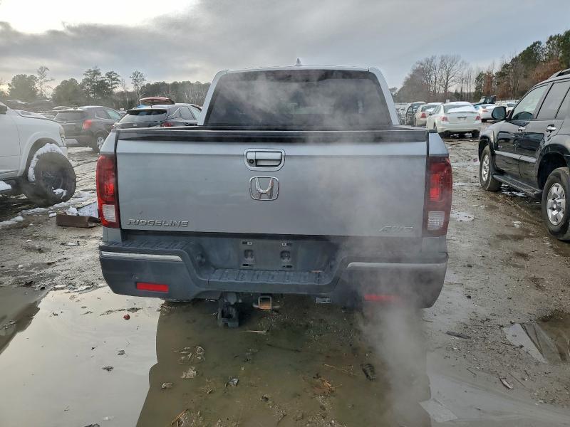 Photo 6 from auction – 2019 HONDA RIDGELINE with VIN 5FPYK3F16KB036849