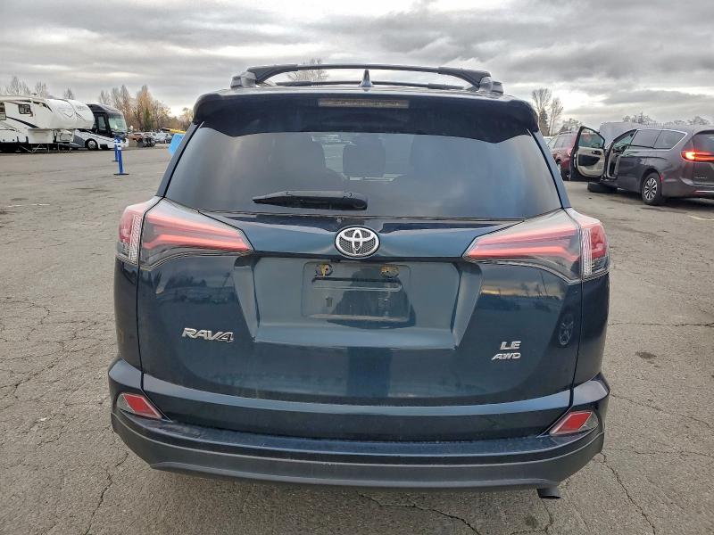 Photo 6 from auction – 2017 TOYOTA RAV4 LE with VIN 2T3BFREV7HW550917