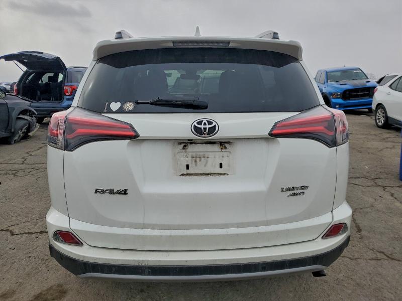 Photo 6 from auction – 2018 TOYOTA RAV4 LIMIT with VIN 2T3DFREV3JW788424