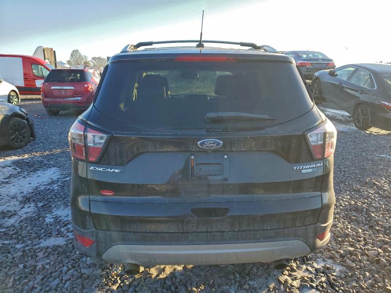 Photo 6 from auction – 2017 FORD ESCAPE with VIN 1FMCU9JD4HUD07730