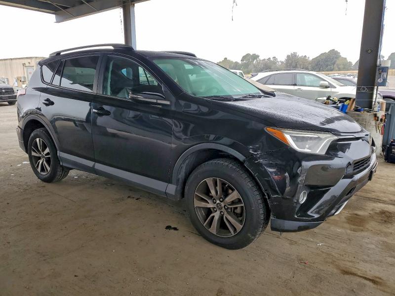 Photo 4 from auction – 2017 TOYOTA RAV4 with VIN 2T3WFREV4HW352183