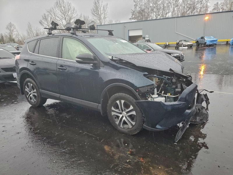Photo 4 from auction – 2017 TOYOTA RAV4 LE with VIN JTMBFREV9HJ171139