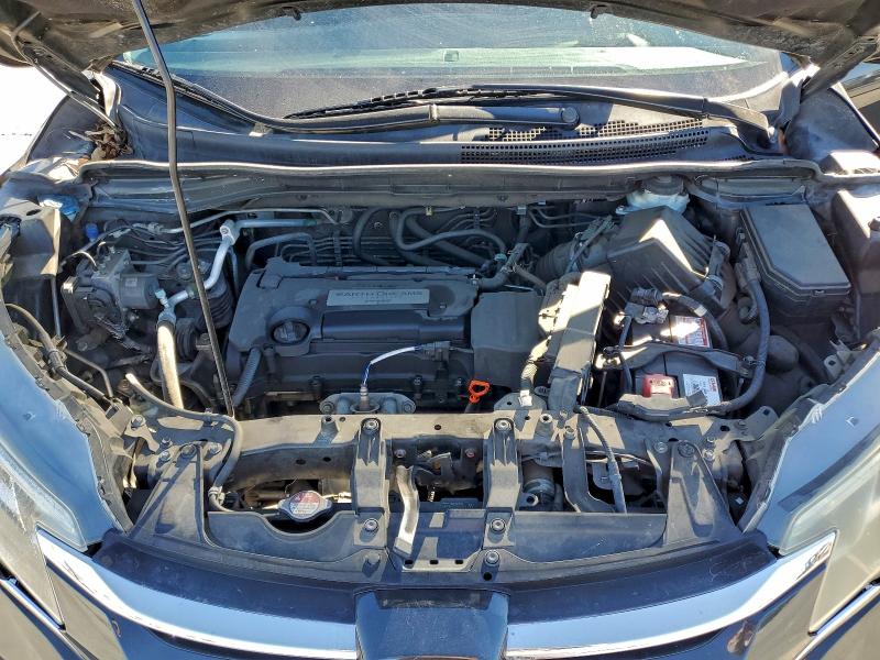 Photo 12 from auction – 2015 HONDA CR-V LX with VIN 5J6RM4H38FL082482