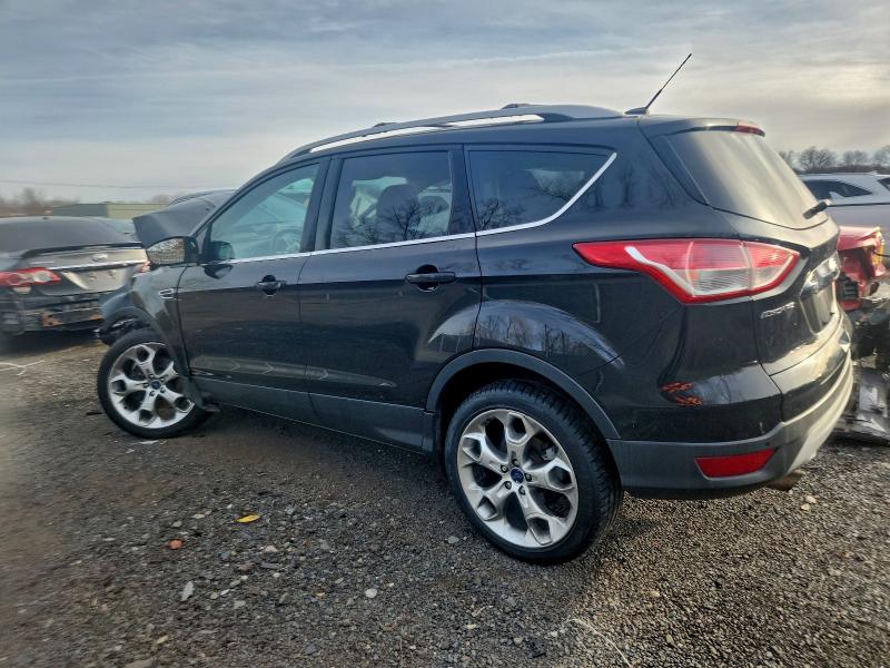 Photo 2 from auction – 2014 FORD ESCAPE TIT with VIN 1FMCU9J98EUA73227
