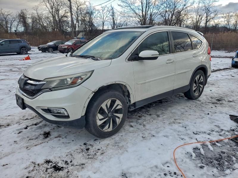 HONDA CR-V TOURI 2015 with VIN 5J6RM4H90FL013208 - Photo from auction
