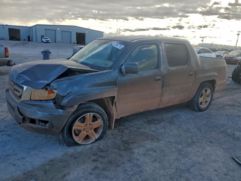 HONDA RIDGELINE 2011 with VIN 5FPYK1F51BB006696 - Photo from auction