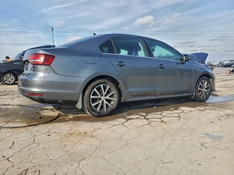 Photo 3 from auction – 2018 VOLKSWAGEN JETTA SE with VIN 3VWDB7AJ5JM260143