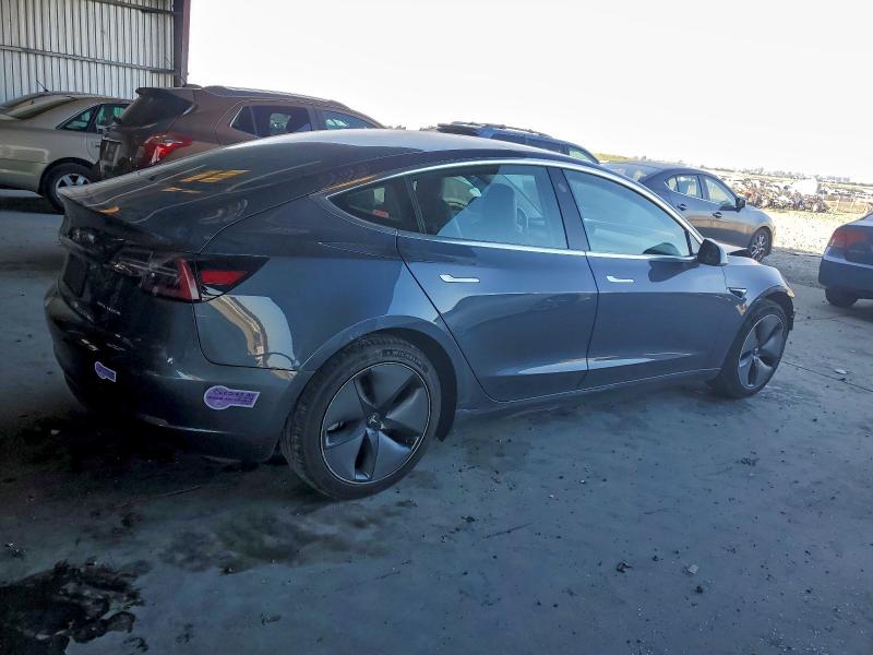 Photo 3 from auction – 2019 TESLA MODEL 3 with VIN 5YJ3E1EB0KF385921