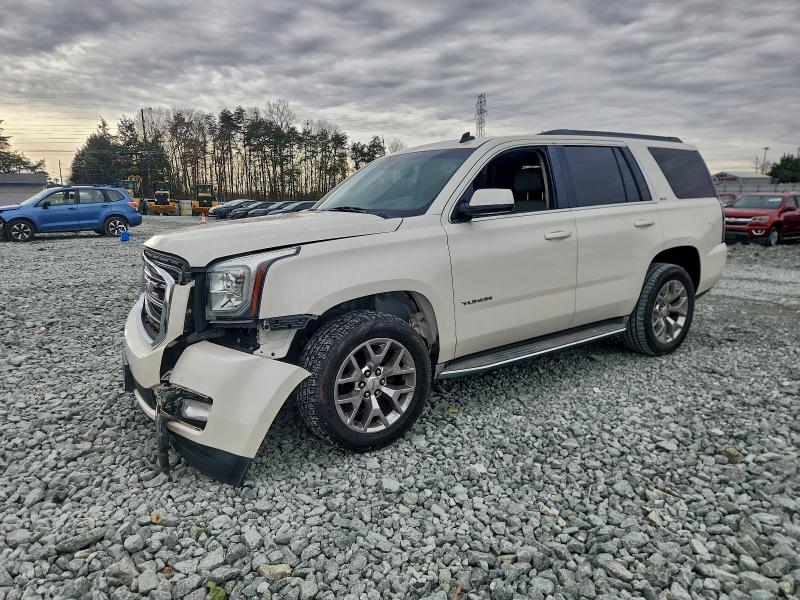 GMC YUKON SLT 2015 with VIN 1GKS1BKC0FR106630 - Photo from auction