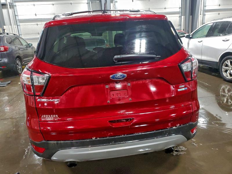 Photo 6 from auction – 2018 FORD ESCAPE SE with VIN 1FMCU9GD6JUC19291