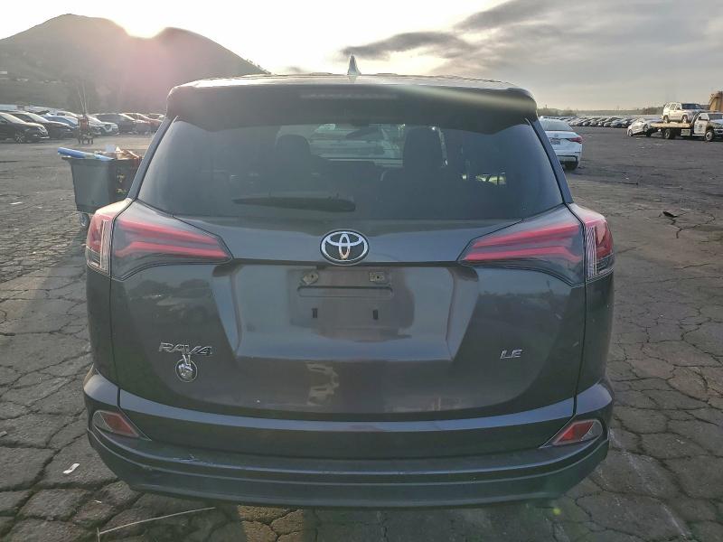 Photo 6 from auction – 2018 TOYOTA RAV4 LE with VIN JTMZFREV7JJ194293