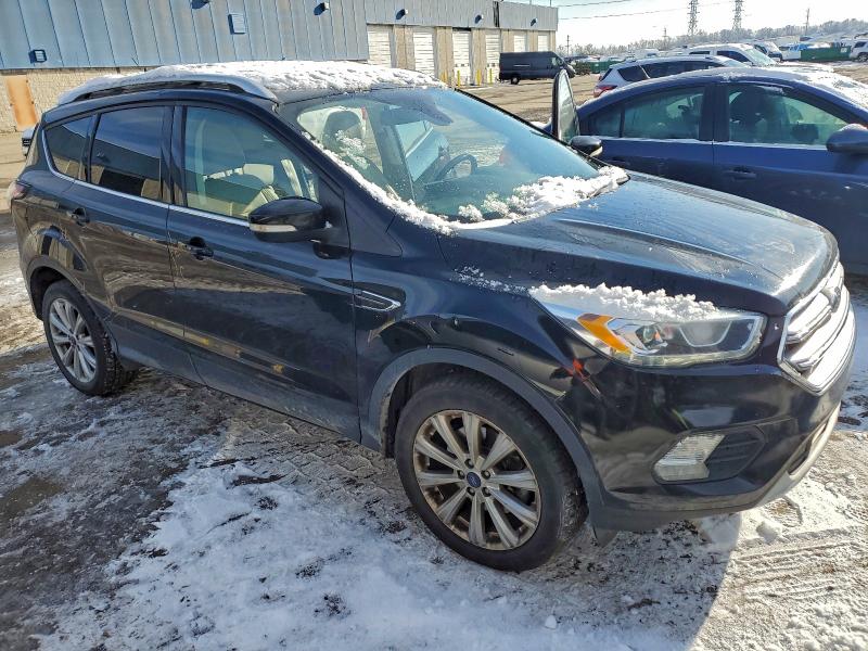 Photo 4 from auction – 2017 FORD ESCAPE TIT with VIN 1FMCU9J92HUC99171