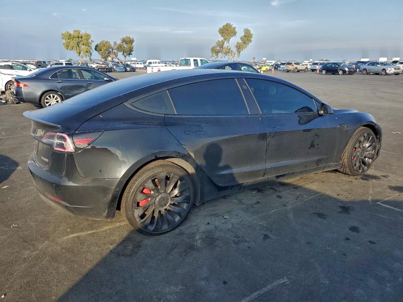 Photo 3 from auction – 2022 TESLA MODEL 3 with VIN 5YJ3E1EC7NF298630