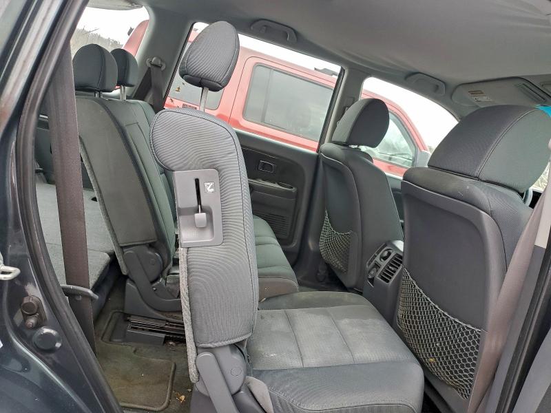 Photo 10 from auction – 2006 HONDA PILOT with VIN 2HKYF18106H555613