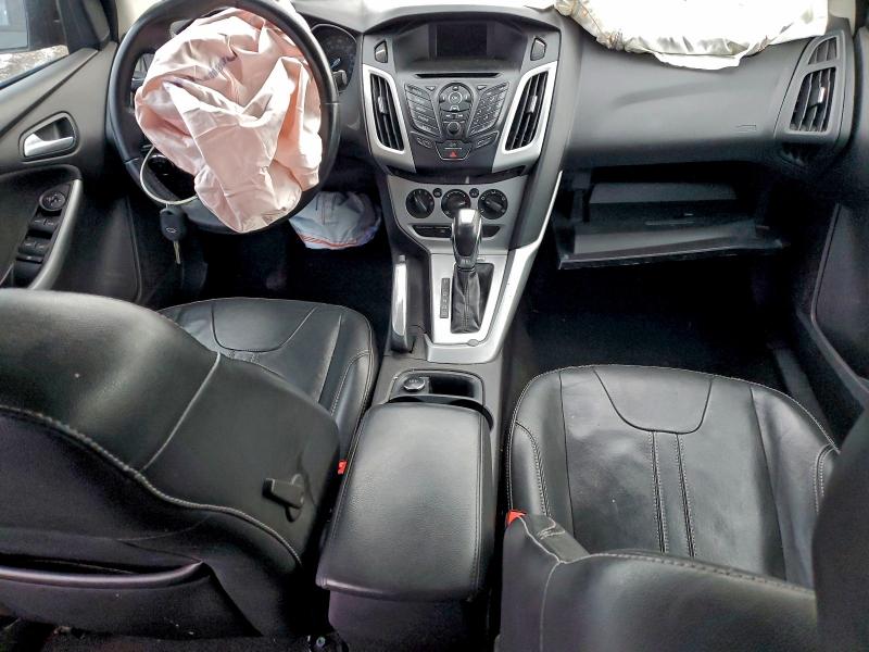 Photo 8 from auction – 2014 FORD FOCUS with VIN 1FADP3F26EL104849