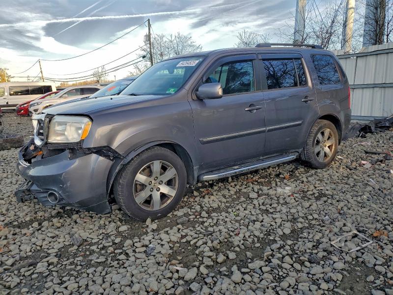 HONDA PILOT TOUR 2014 with VIN 5FNYF4H92EB003731 - Photo from auction