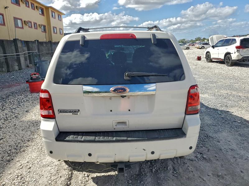 Photo 6 from auction – 2010 FORD ESCAPE LIM with VIN 1FMCU0E76AKC17318