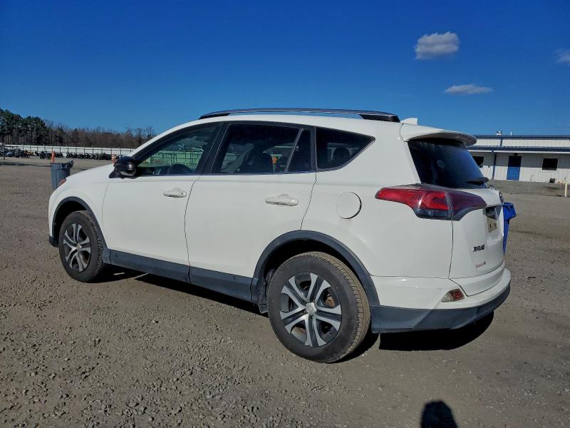 Photo 2 from auction – 2016 TOYOTA RAV4 LE with VIN JTMBFREV0GJ065385