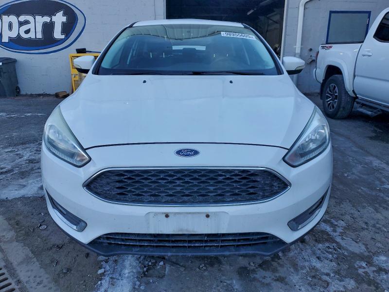 Photo 5 from auction – 2017 FORD FOCUS S with VIN 1FADP3E20HL200935