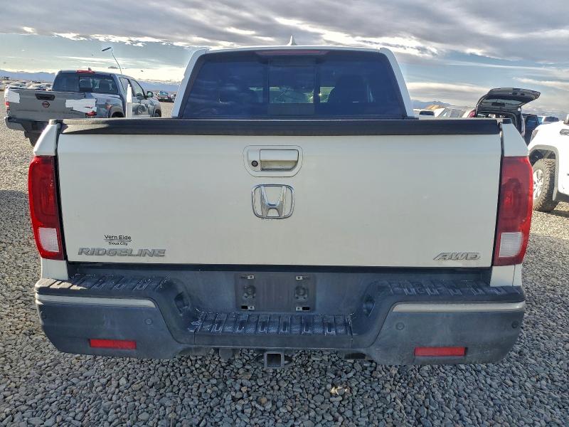 Photo 6 from auction – 2019 HONDA RIDGELINE with VIN 5FPYK3F72KB002377
