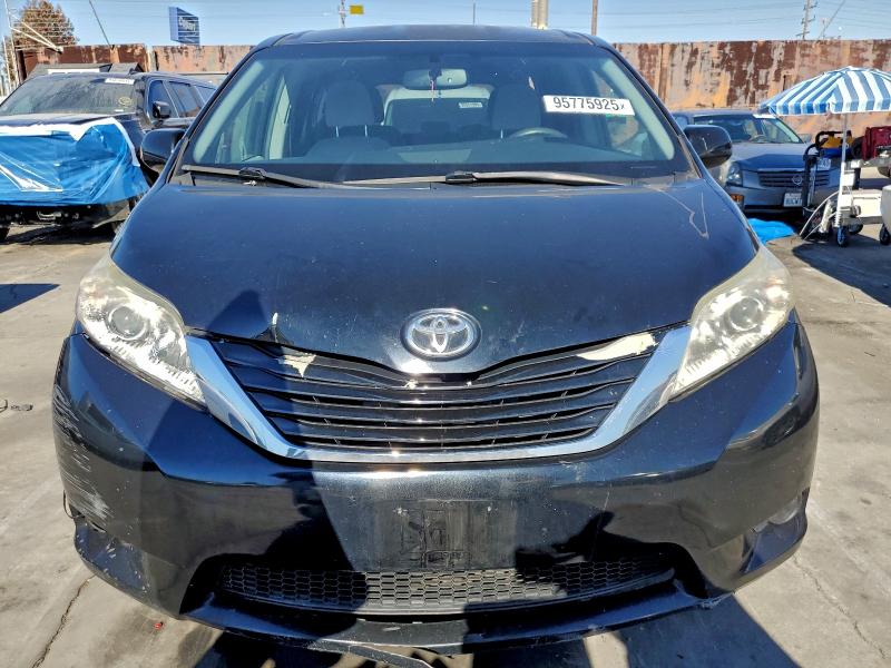 Photo 5 from auction – 2015 TOYOTA SIENNA LE with VIN 5TDKK3DC2FS664704