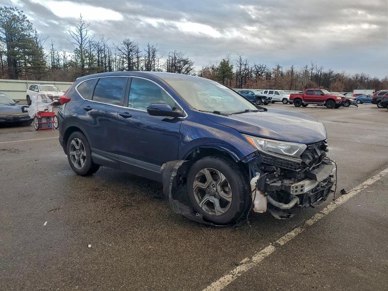 Photo 4 from auction – 2019 HONDA CR-V with VIN 7FARW1H86KE025600