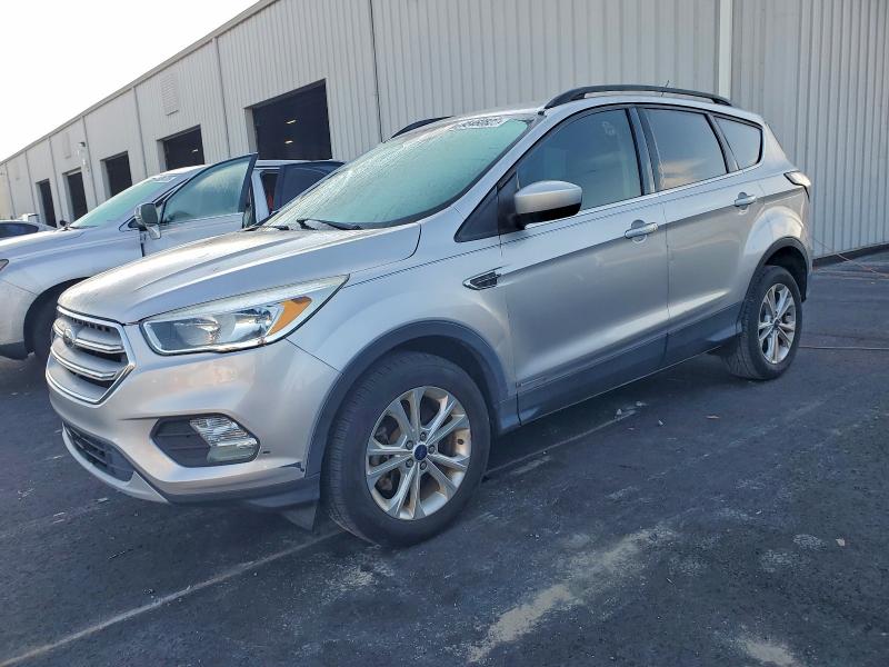 FORD ESCAPE SE 2018 with VIN 1FMCU9GD4JUA98776 - Photo from auction