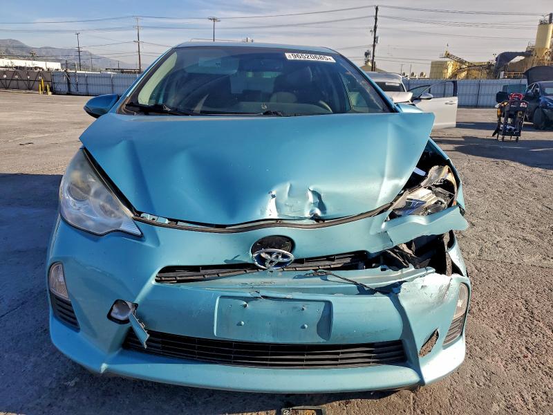 Photo 5 from auction – 2014 TOYOTA PRIUS C with VIN JTDKDTB3XE1060004