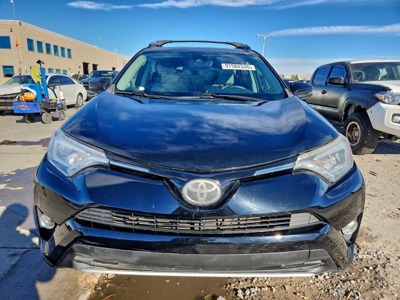 Photo 5 from auction – 2017 TOYOTA RAV4 LIMIT with VIN 2T3DFREV1HW685707
