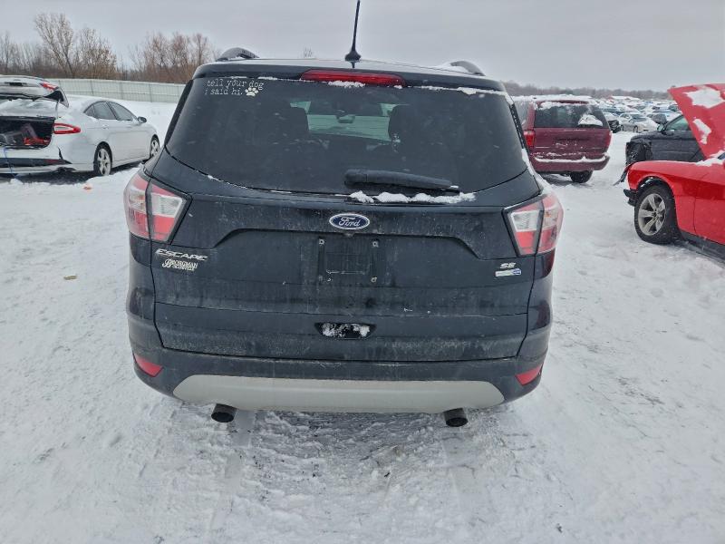 Photo 6 from auction – 2018 FORD ESCAPE SE with VIN 1FMCU9GDXJUA96563
