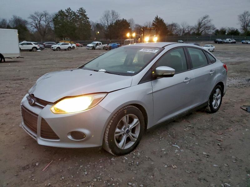 FORD FOCUS SE 2014 with VIN 1FADP3F23EL430303 - Photo from auction