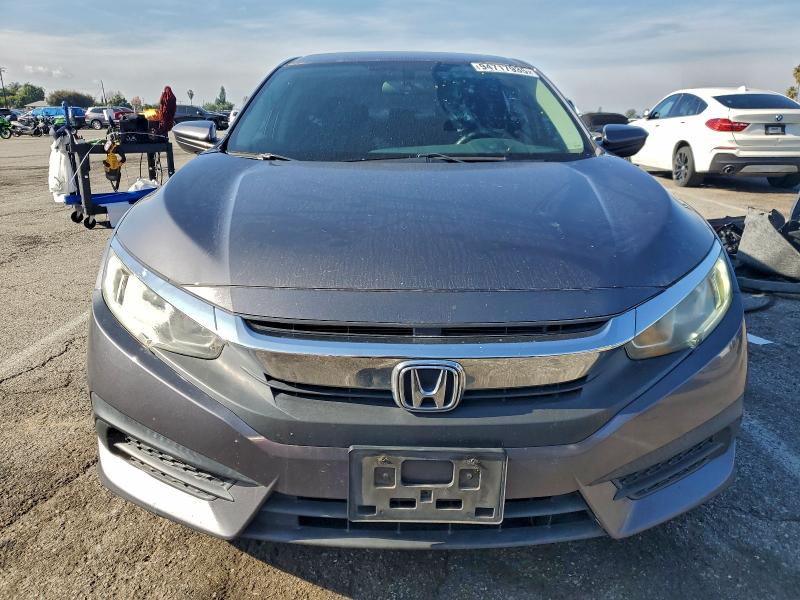 Photo 5 from auction – 2016 HONDA CIVIC LX with VIN 2HGFC2F57GH572559