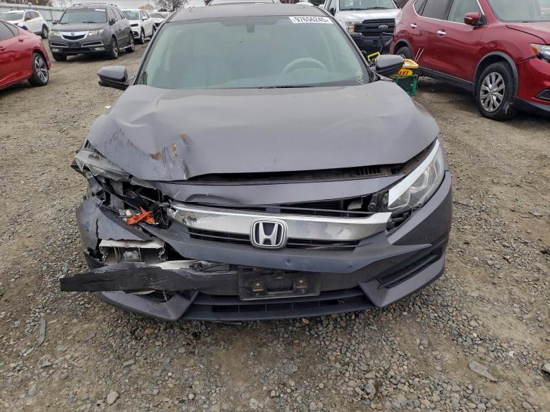 Photo 5 from auction – 2018 HONDA CIVIC EX with VIN 2HGFC2F70JH594430