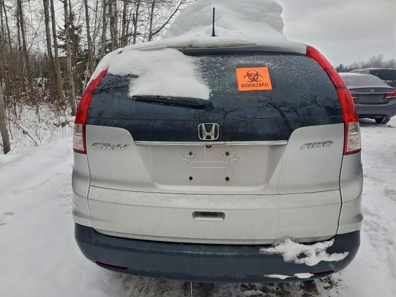 Photo 6 from auction – 2012 HONDA CR-V LX with VIN 2HKRM4H36CH112584